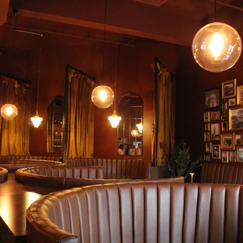 A romantic restaurant with comfy booths