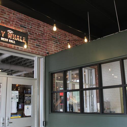 A window looking into a restaurant kitchen