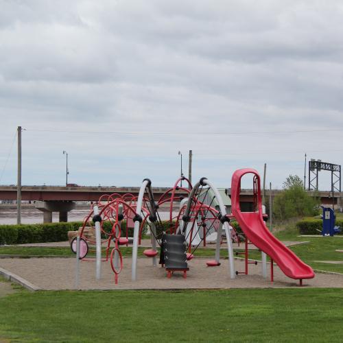 Red and white playground along the riverfront