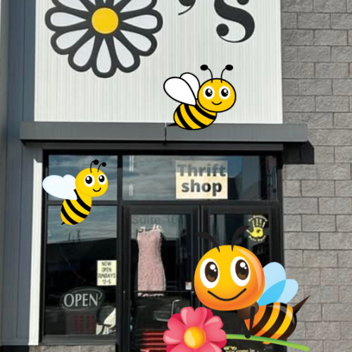 Dayzee's Fashions store front surrounded by cute bee graphics.