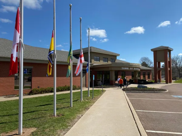 The flags at Town Hall at half-mast