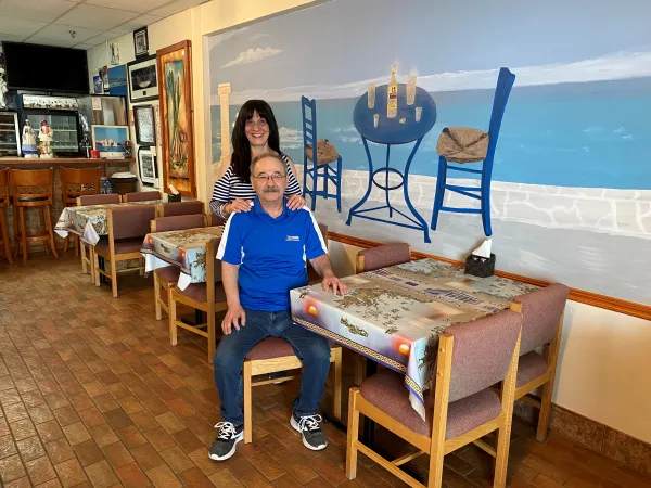 Mike and his wife, Eleni inside Bravo Pizza