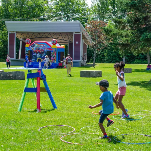 Children playing lawn games in a park