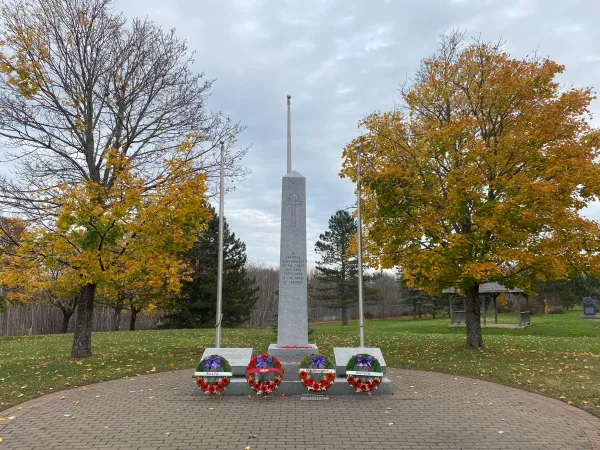 Cenotaph monument with remembrance day wreaths