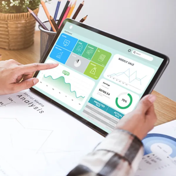 Computer with digital marketing statistics.