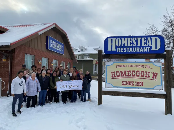 The Homestead staff pictured outside of the resturaunt. 