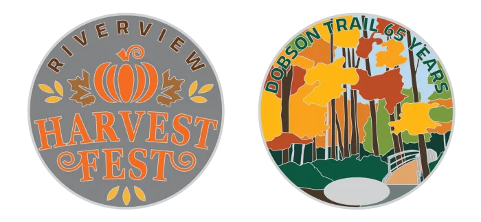 A geocoin image with fall coloured leaves and Harvest Fest logo