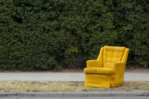 Yellow chair on curbside