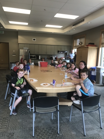 Mr. Trenholm's Grade 4 class having a pizza party at Town Hall