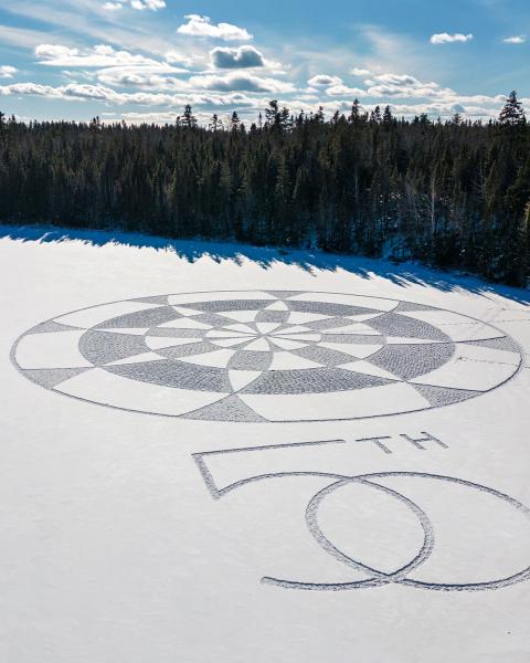 Snowshoe art on the frozen reservoir at Mill Creek Nature Park