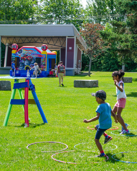 Children playing lawn games in a park