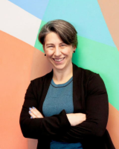 Three women smiling in their businesses